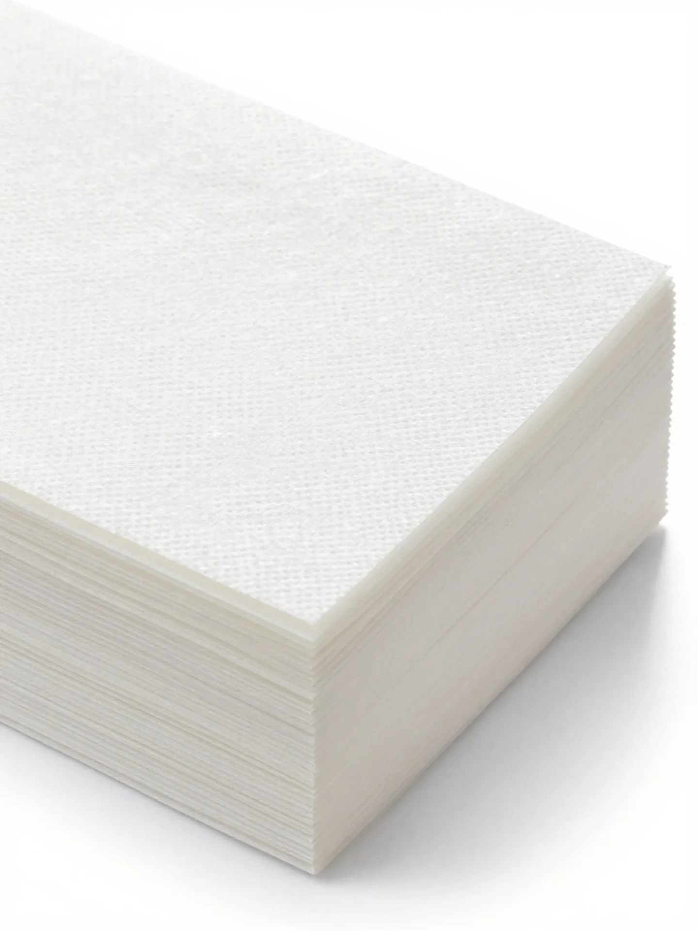 Close-up of white greaseproof paper sheets showing texture - Wabs Print UK