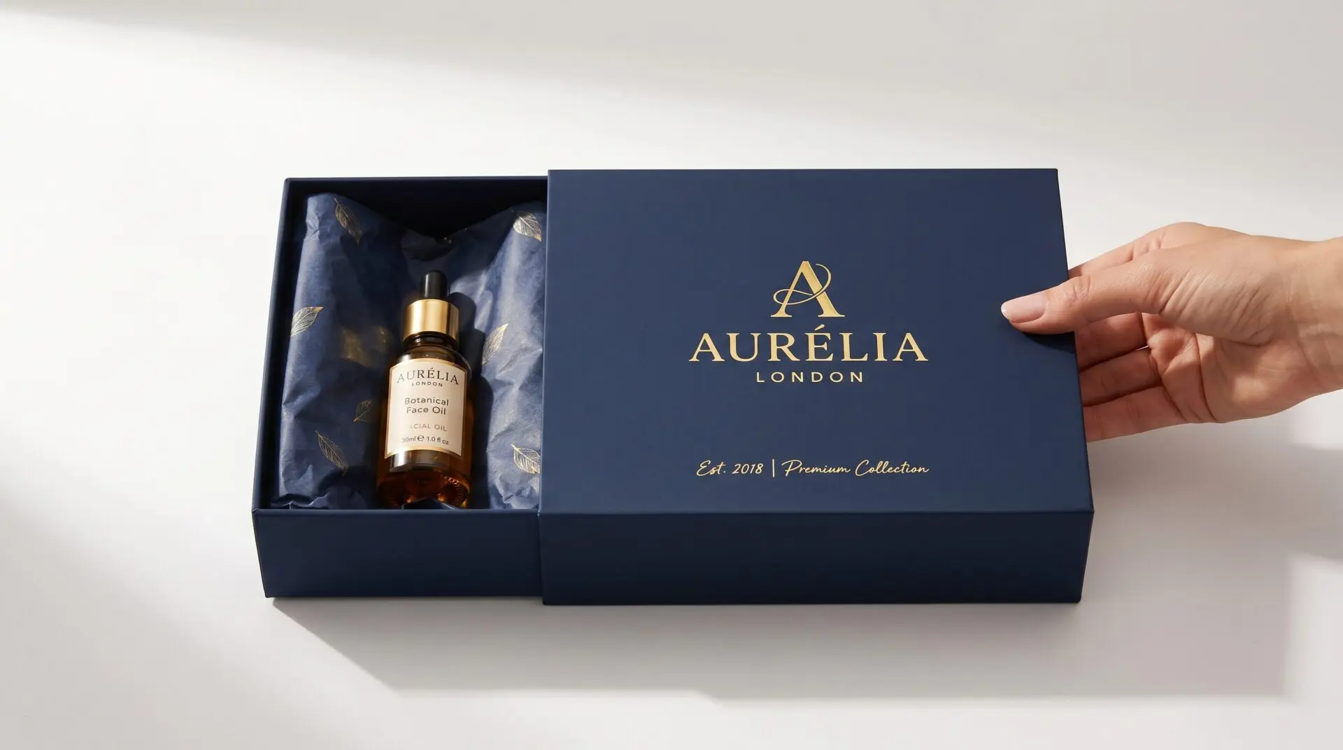 Premium sleeve box UK sliding open to reveal product inside   tray and sleeve packaging with branded print and ribbon pull tab
