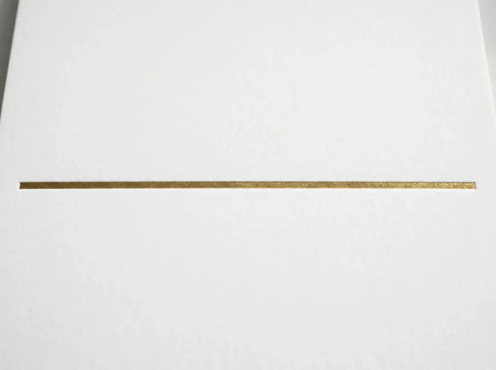 Soft-touch laminate gold foil accent indie cosmetic packaging UK | Wabs Print